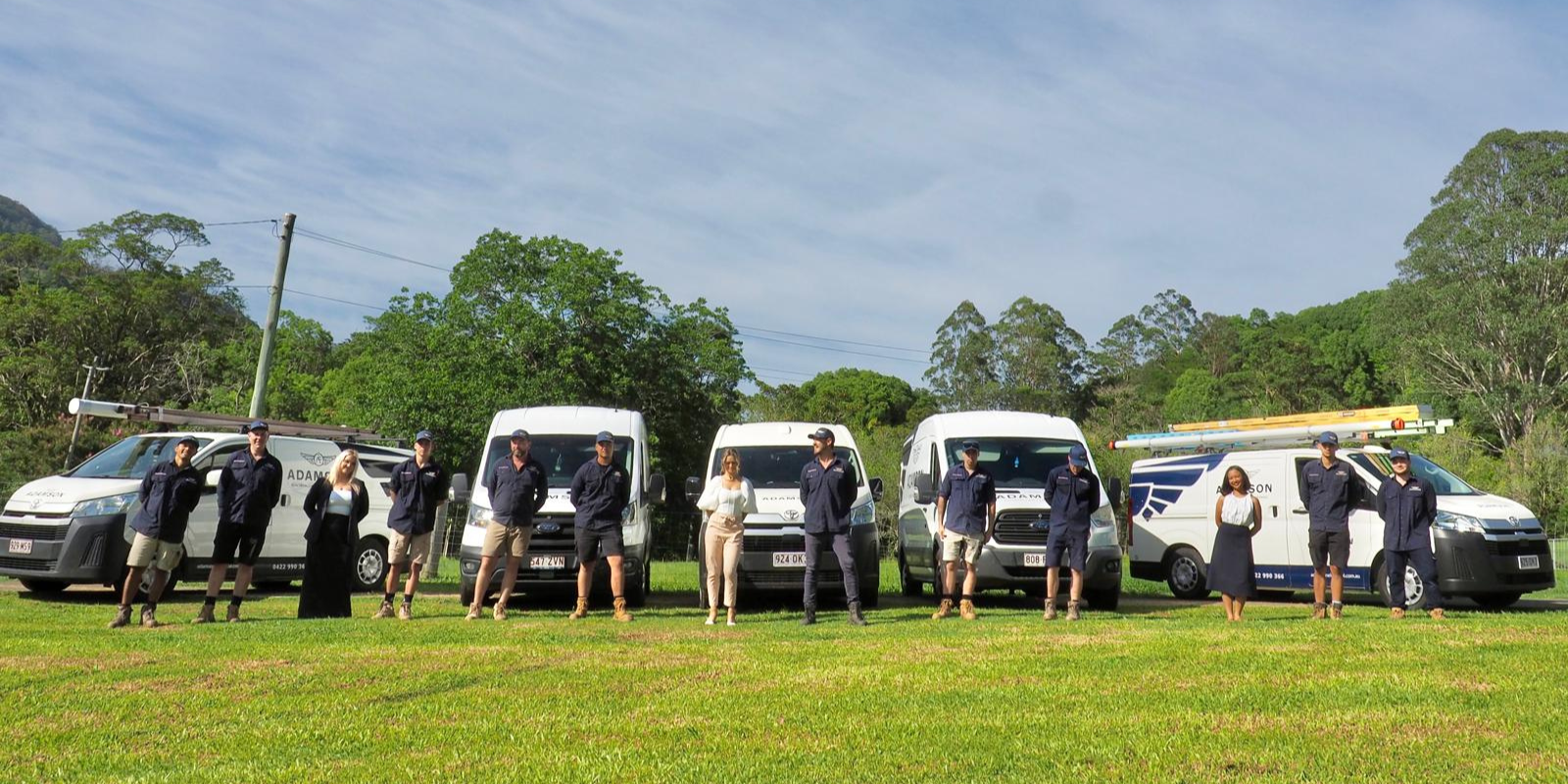 Adamson team and vans — Gold Coast