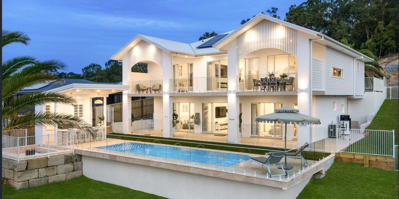 Architectural Gold Coast home at dusk — Adamson